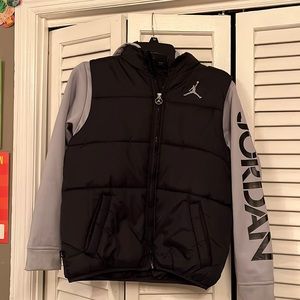 Nike Jordan  puffer vest with fleece sleeves attached.